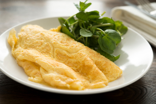 Plain omelette with watercress.