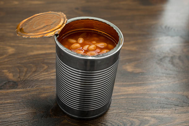 Can of Baked beans An open can of baked Beans. Tin of Baked Beans stock pictures, royalty-free photos & images