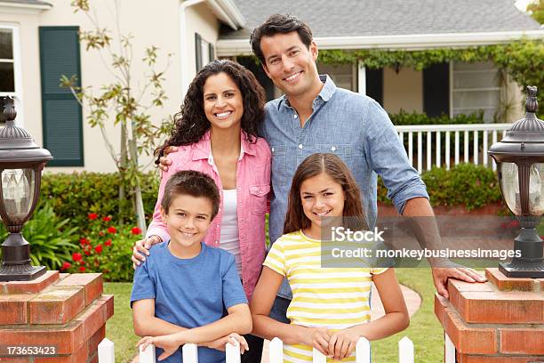 Hispanic Family Outside Home Stock Photo - Download Image Now - Family, Perfection, House