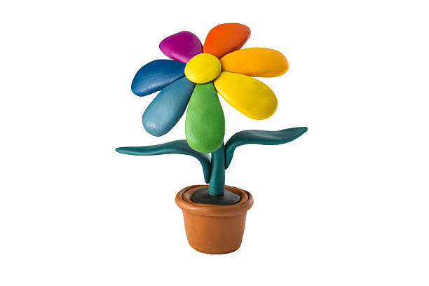 istock Plasticine colorful flower with leaves in brown pot 173655644