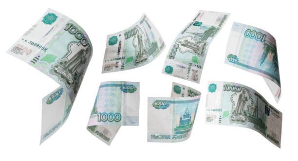 istock 1000 Rubles flying on white background. Russian banknotes at different angles. 1736556688
