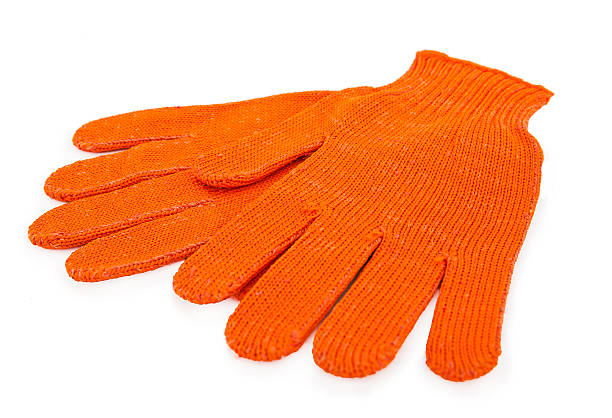 istock orange gloves isolated on white 173656238