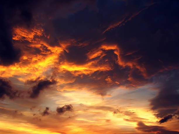 istock Dramatic sunset like fire in the sky with golden clouds 173656267
