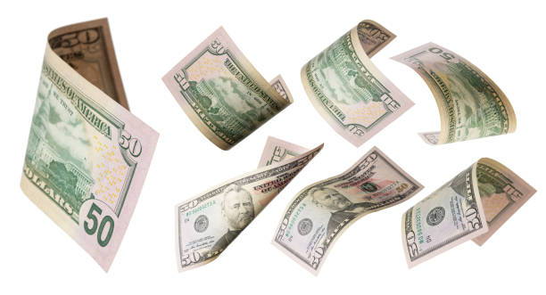 istock 50 dollars flying on white background. USA banknotes at different angles. Front side 1736567007