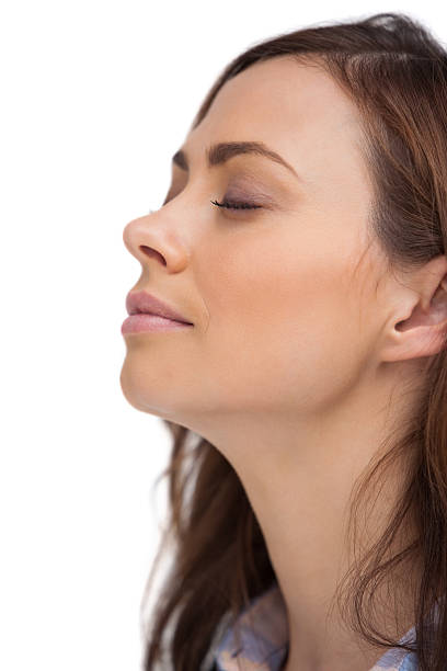 istock Woman relaxing and closing her eyes 173656882