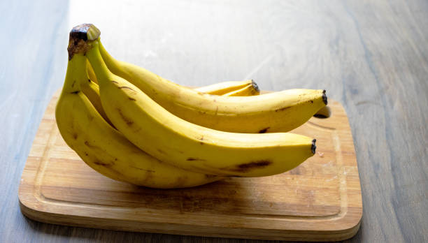 istock bananas on a wooden board 1736574640