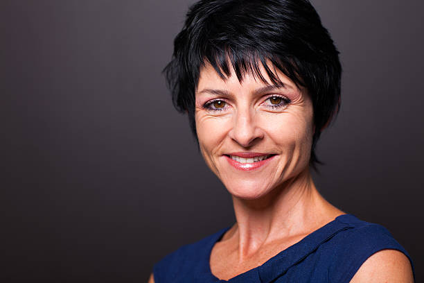 istock pretty middle aged woman closeup 173659935