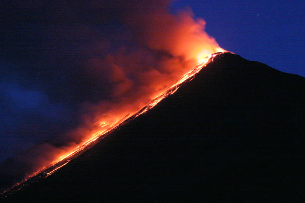 istock Volcanic activity that is erupting emits hot lava 1736600361