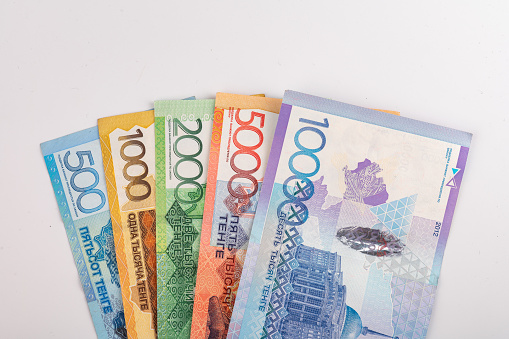 Kazakhstan money - tenge. 500, 1000, 2000, 5000, 10000 banknotes. Close up of tenge on white background. High quality photo