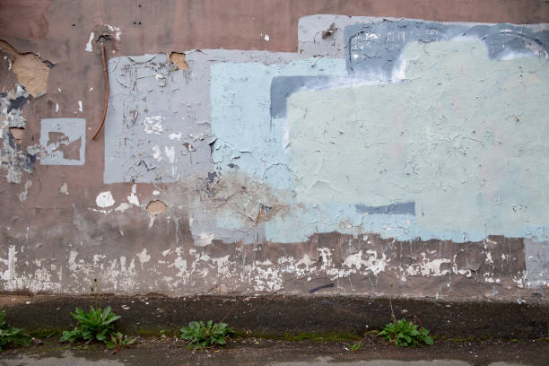istock Old damaged grunge wall background or texture. Street background 1736617792