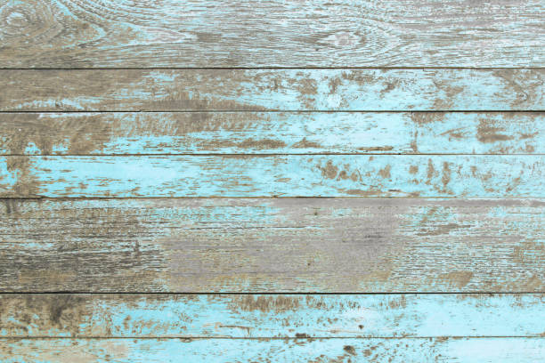istock Wall of blue color wood texture background surface with old natural pattern or cracks wood table top view. Grunge surface with wooden planks texture background. Vintage timber texture rustic design. 1736635476