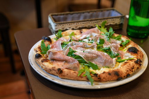 Neapolitan Pizza of Prosciutto and Arugula