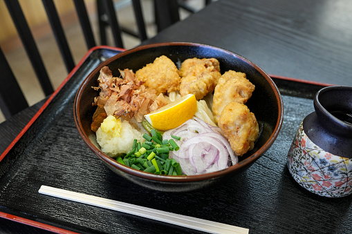 Sanuki udon noodles with chicken tempura on top.