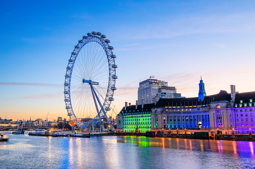 London, England, UK - March 15, 2023: The London Eye, or the Millennium Wheel at sunrise.
