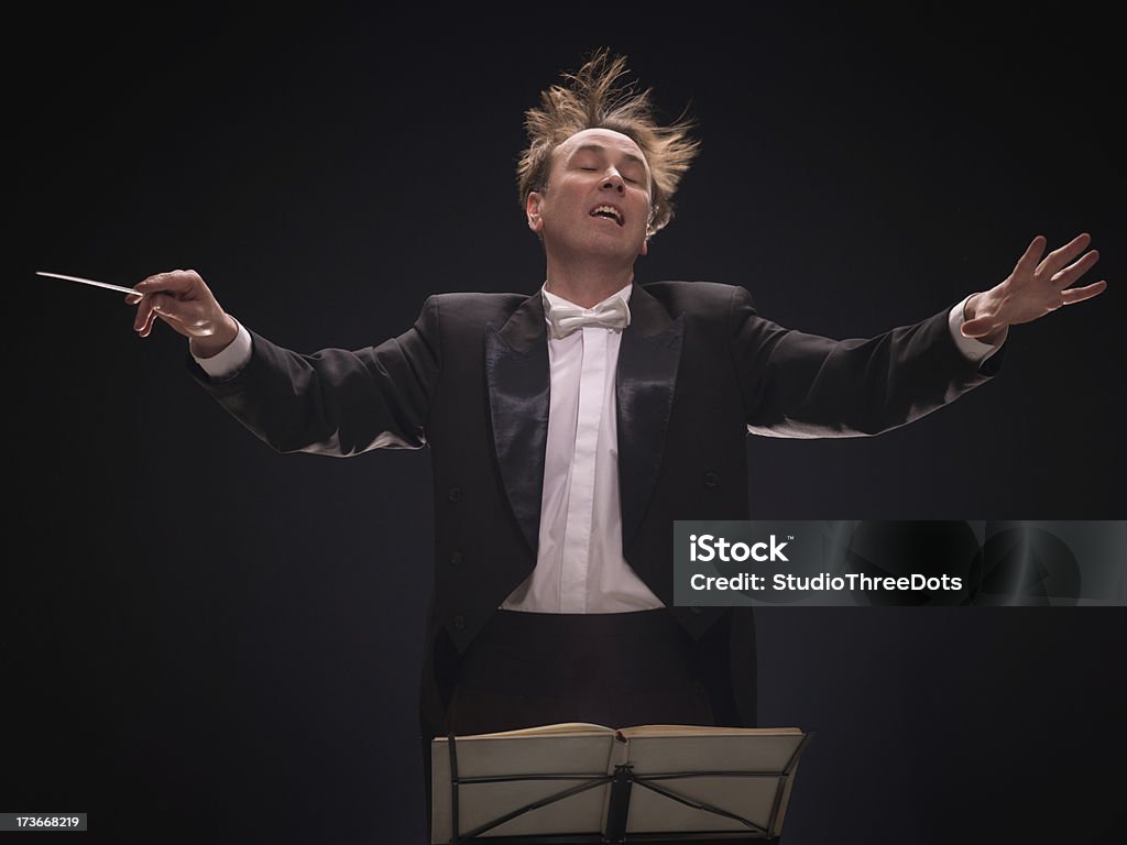 conductor - Zbiór zdjęć royalty-free (Dyrygent)