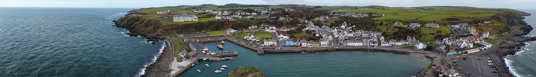 Drone point of view of small fishing town