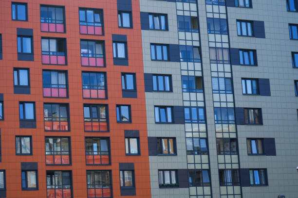 istock Facade of a multi-storey building. Fragment 1736696016