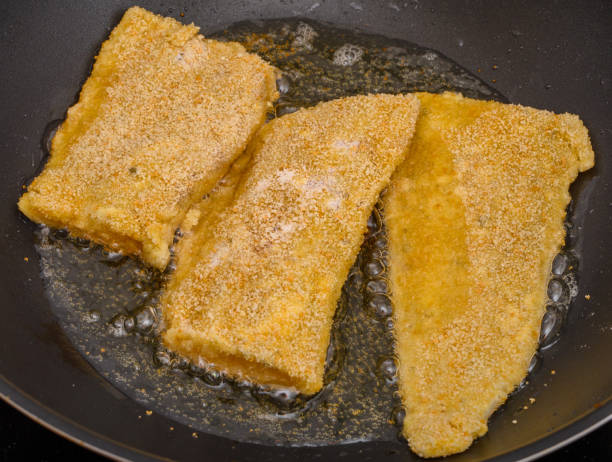 istock Breaded sea fish fillets fried in rapeseed oil 1736699420