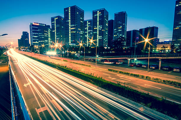 istock light trails on the modern city at dusk in beijing 173670299
