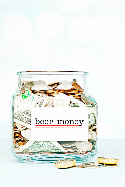 istock Savings Jar Filled with Money for Beer 173670324