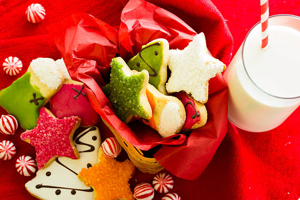 Christmas cookies Assorted christmas cookies on red background. round sugar cookie stock pictures, royalty-free photos & images