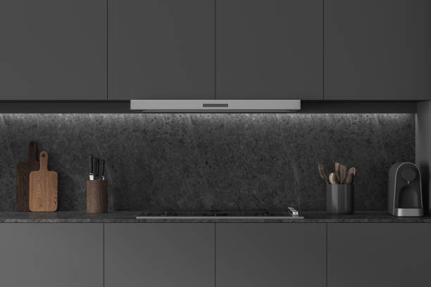 istock Grey home kitchen interior with stove and hood, kitchenware on countertop 1736736965