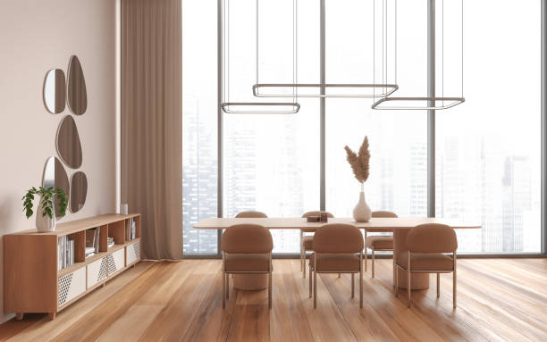 istock Cozy living room interior with chairs and table, sideboard and panoramic window 1736739001