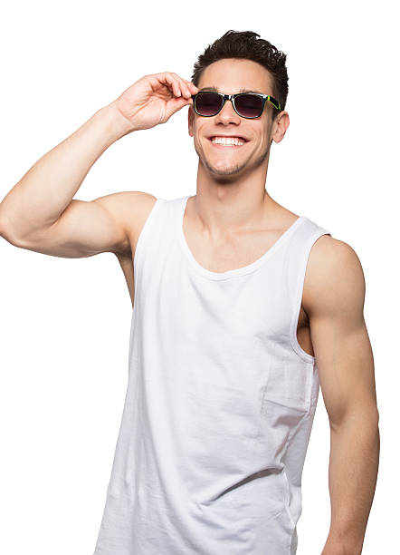 Man In Tanktop Holding Goggle stock photo