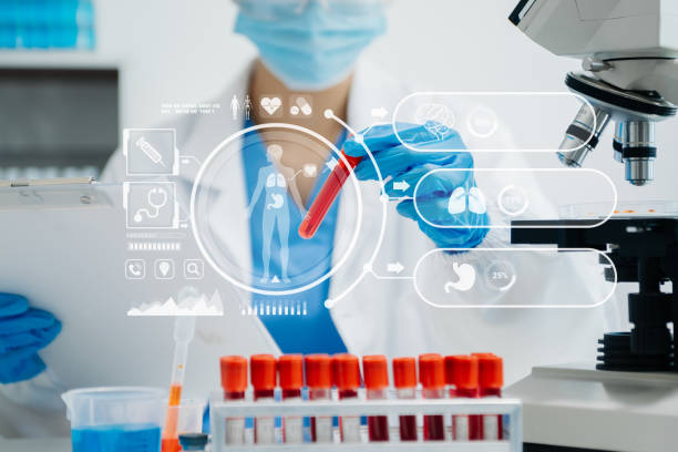 istock DNA molecule testing concepts. The doctor in a mask examines DNA molecules on the chemical laboratory with virtual icon 1736765478