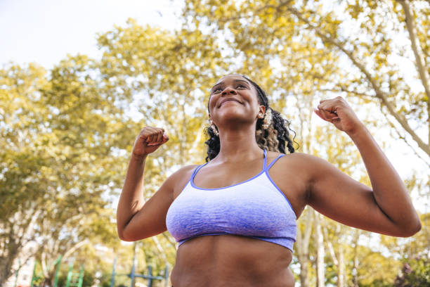 istock Young woman training in a public New York running track 1736798505