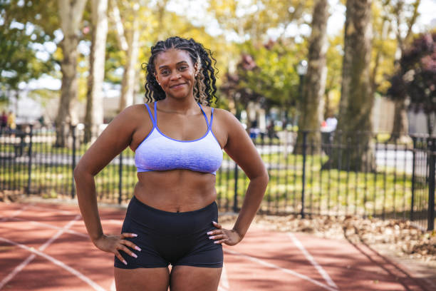 istock Young woman training in a public New York running track 1736799043