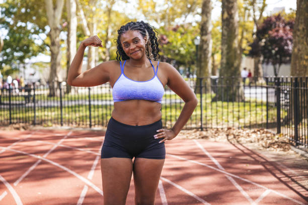 istock Young woman training in a public New York running track 1736799588