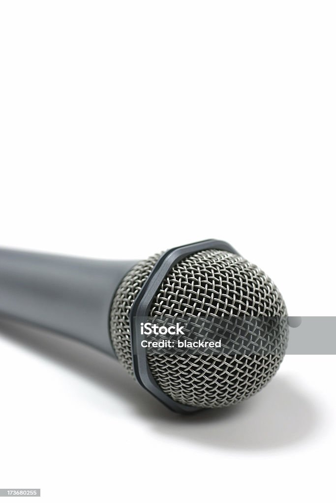 Microphone Close up of a microphone against isolated white background.Similar images - Announcement Message Stock Photo