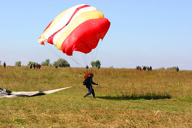 istock Landing of parachutist 173681044