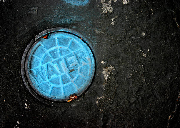 sewer cover stock photo