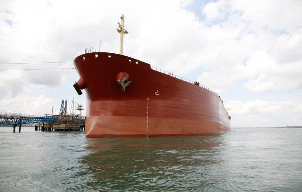 istock Super Tanker Along Side the Refinery 173681482