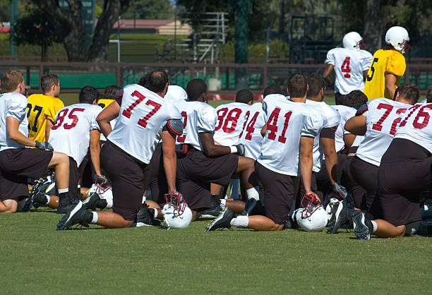 istock Football practice - On the sidelines 173682678