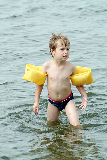 istock Boy shivering in Dutch lake 173682939