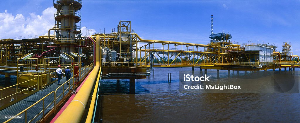 Off shore oil industry with some engineers Petroleum production platform. Offshore Platform Stock Photo