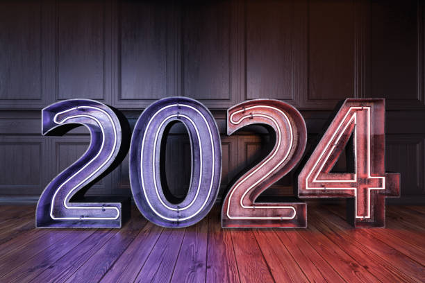 istock 2024 Neon Sign Against Black Wall 1736846119