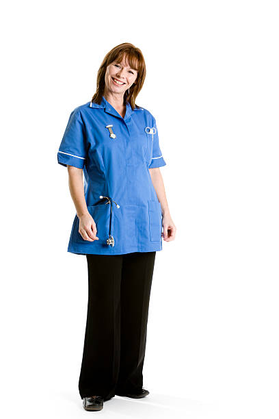 cuidados de saúde: saudar - nurse midwife full length nhs imagens e fotografias de stock