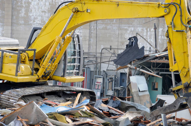 istock Crane razing printing plant 173685386
