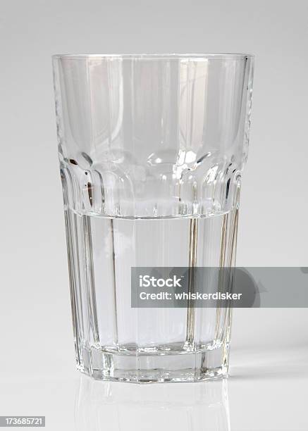 Glass Half Empty Or Full Contains Clipping Path Stock Photo - Download Image Now - Clean, Clipping Path, Cold Drink