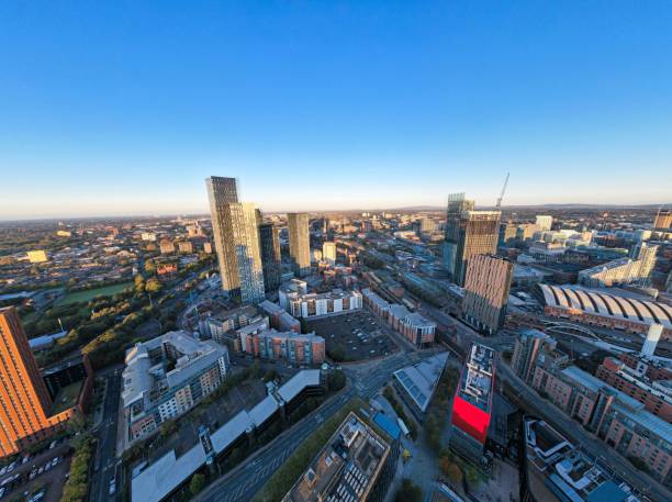 istock Manchester City Centre Drone Aerial View Above Building Work Skyline Construction Blue Sky 2023 Deansgate 1736859166