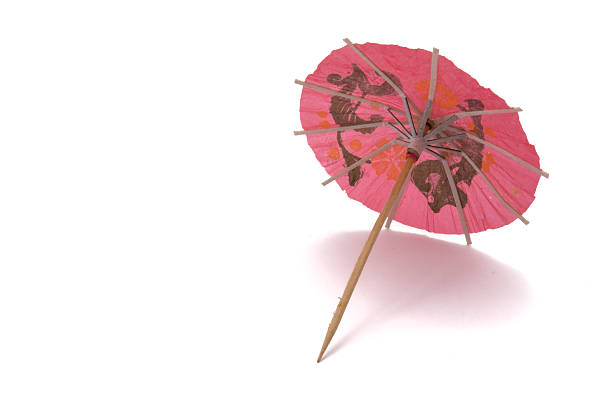 rosa ombrellino da cocktail - drink umbrella umbrella parasol drink foto e immagini stock