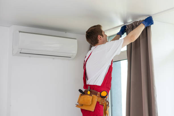 istock A handyman installing new cornice for curtains, home repair and renovation works. 1736871155