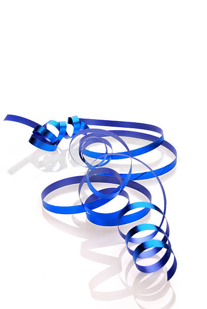 istock Blue curly ribbon isolated on white - vertical 173687239