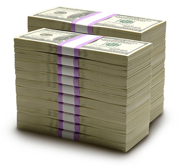 Big Bucks Two Tall Stacks of Cash on White. bundle stock pictures, royalty-free photos & images