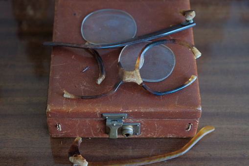 old broken glasses. Vintage broken glasses