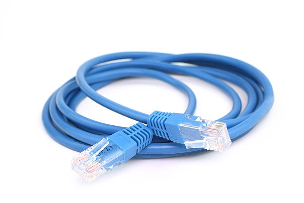 Blue network connection cable neatly curled up Network connection cable network connection plug stock pictures, royalty-free photos & images